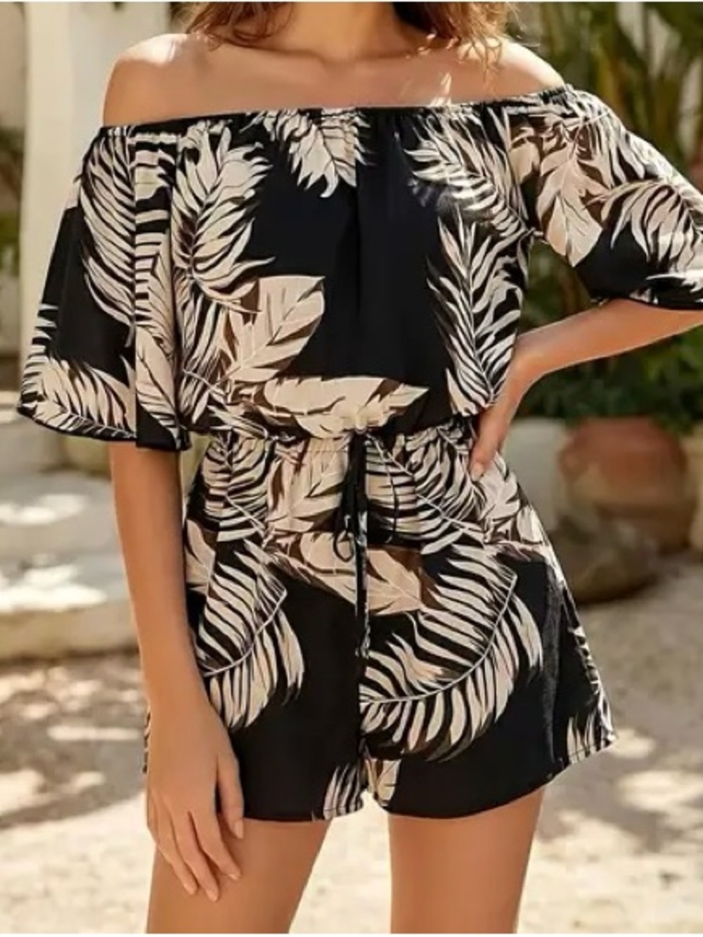 Lizzie’s Boutique Off-Shoulder Black and Beige Tropical Print Romper - Picture 4 of 13